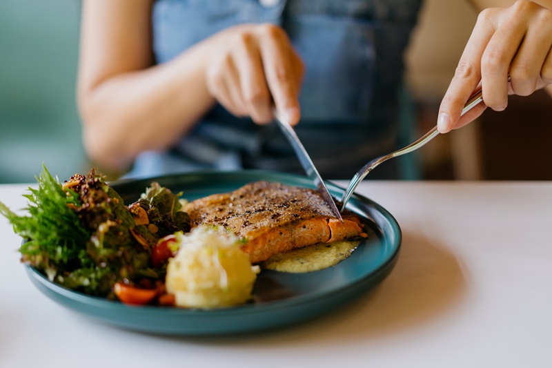 woman eating healthy balanced meal