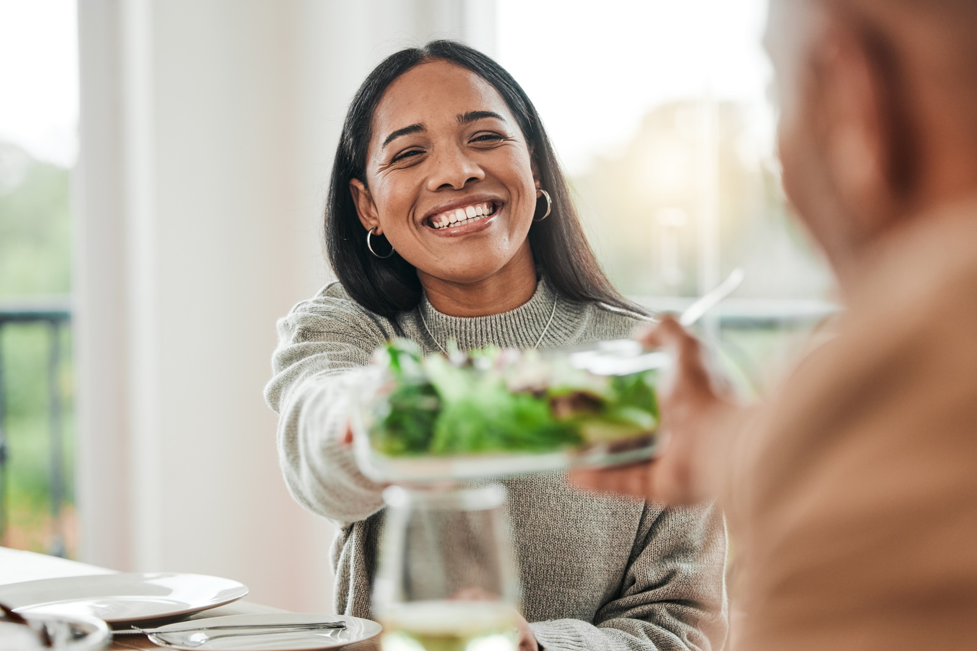 Happy woman eating thanksgiving dinner