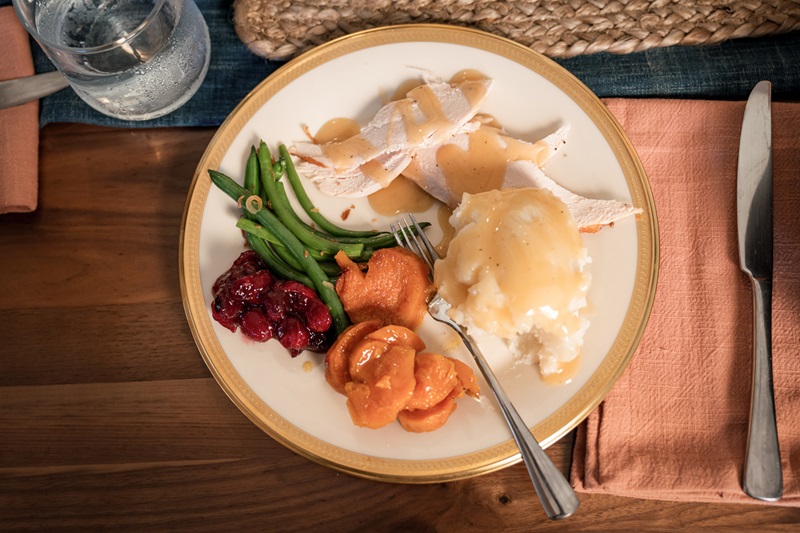 Thanksgiving dinner portioned onto a plate