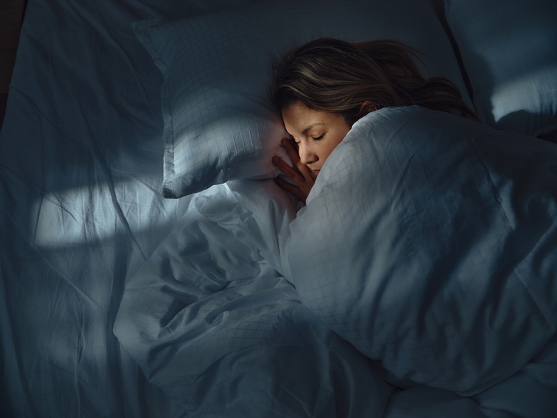 woman sleeping in bed